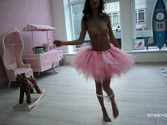 Sveta dancing wearing a pink ballerina tutu dress Thumb