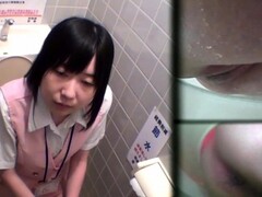 Asian teen pees in toilet Thumb